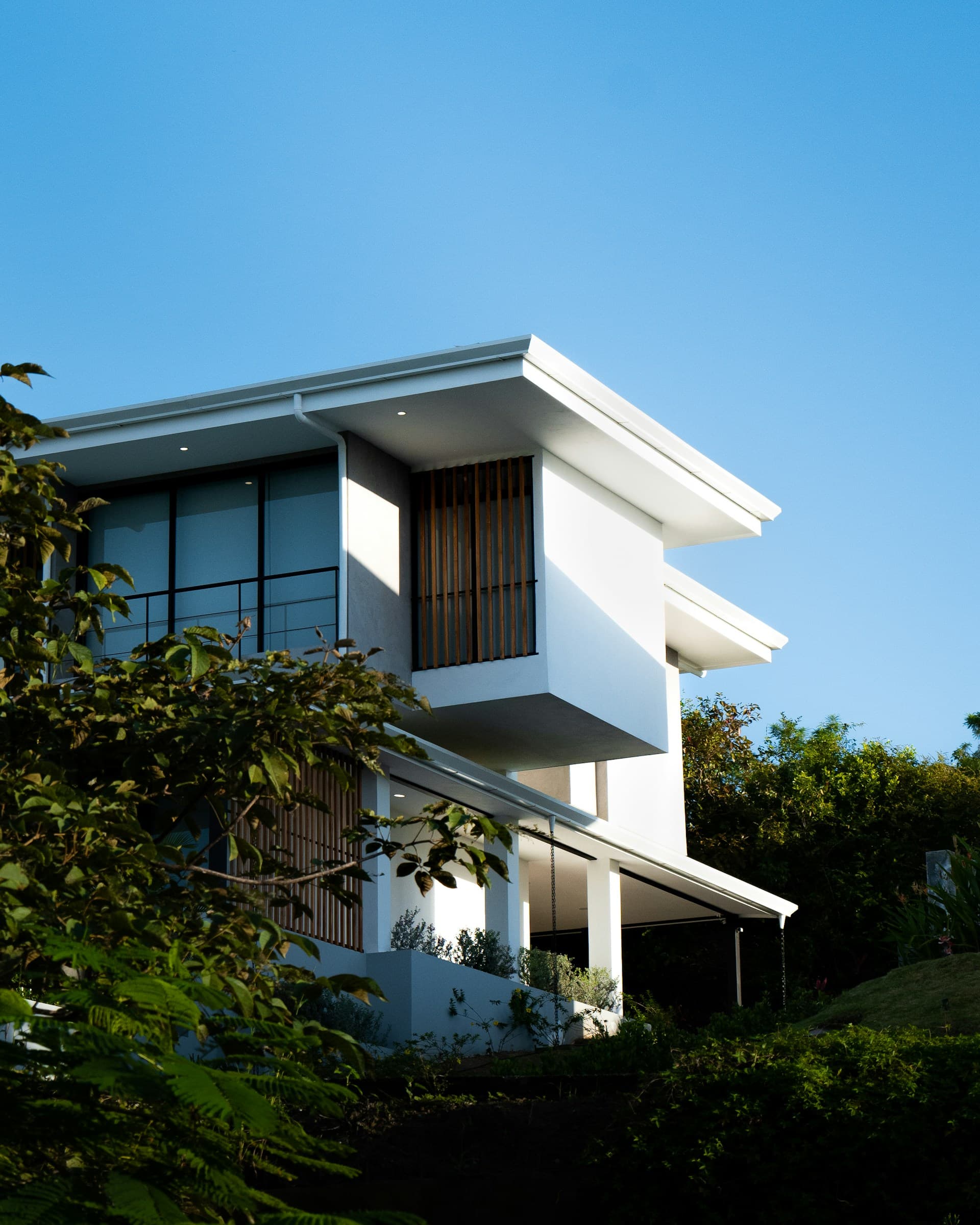 A modern building beneath a clear blue sky